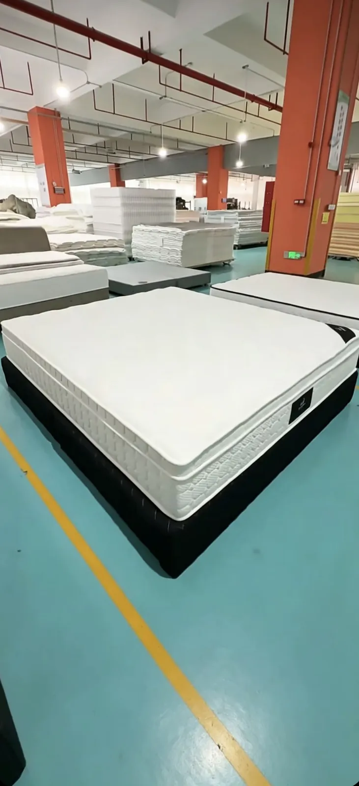 Finished mattress displayed on the factory floor